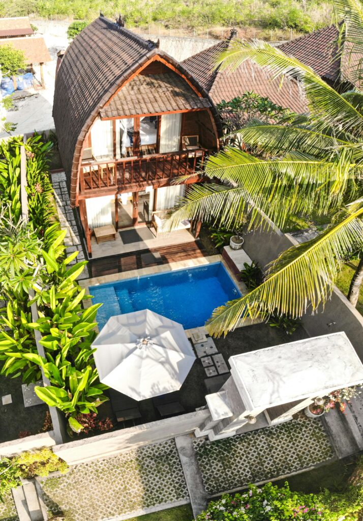 Explore luxury and tranquility at this tropical villa in Bali, featuring a private pool and lush gardens.